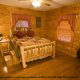 Large country pine bedroom  in cabin 79 (Robyns Nest), in Pigeon Forge, Tennessee.