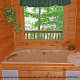 Enjoy your own private  jacuzzi in cabin 80 (Heavenly Haven), in Pigeon Forge, Tennessee.