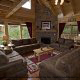 Living room with fireplace in cabin 807 (Blackbeary Ridge) at Eagles Ridge Resort at Pigeon Forge, Tennessee.
