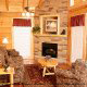 Living room with fire place in cabin 812 (Eagles Perch) , in Pigeon Forge, Tennessee.