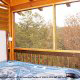 Back porch with hot tub in cabin 813 (Heavenly View) at Eagles Ridge Resort at Pigeon Forge, Tennessee.