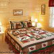 Country bedroom in cabin 815 (As Good As it Gets) at Eagles Ridge Resort at Pigeon Forge, Tennessee.