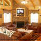 Large living room with fireplace in cabin 826 (Cozy Cabin) , in Pigeon Forge, Tennessee.