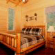 Bedroom View of Cabin 832 (Lakeside Hideaway) at Eagles Ridge Resort at Pigeon Forge, Tennessee.
