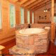Unique Jacuzzi Design - Cabin 832 (Lakeside Hideaway) at Eagles Ridge Resort at Pigeon Forge, Tennessee.