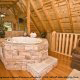 Uniquely Designed Stone Jacuzzi - Cabin 833 (Lakeside Redezvous) at Eagles Ridge Resort at Pigeon Forge, Tennessee.