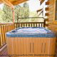 Back Deck with Hot Tub - Cabin 835 (Lakeside Romance) at Eagles Ridge Resort at Pigeon Forge, Tennessee.