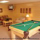 Game room with pool table in cabin 838 (Tennessee Escape) at Eagles Ridge Resort at Pigeon Forge, Tennessee.