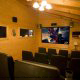 Theater room with theater seating in cabin 838 (Tennessee Escape) at Eagles Ridge Resort at Pigeon Forge, Tennessee.