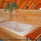 Bathroom View with Jacuzzi of Cabin 84 (Serenity Summit) at Eagles Ridge Resort at Pigeon Forge, Tennessee.
