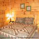 Country bedroom in cabin 845 (Eagle Watch) , in Pigeon Forge, Tennessee.