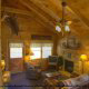 This living room is majestic with its vaulted ceilings in cabin 85 (Smoky Mountain Getaway), in Pigeon Forge, Tennessee.