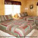 Country bedroom in cabin 853 (Beary Cozy) at Eagles Ridge Resort at Pigeon Forge, Tennessee.