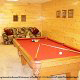 Game room with pool table in cabin 853 (Beary Cozy) at Eagles Ridge Resort at Pigeon Forge, Tennessee.