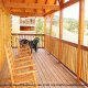 Back porch with rocking chairs in cabin 856 (Eagles Pointe) , in Pigeon Forge, Tennessee.