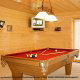 Game room with pool table in cabin 856 (Eagles Pointe) , in Pigeon Forge, Tennessee.