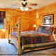 Country Bedroom View of Cabin 857 (A Dream Come True) at Eagles Ridge Resort at Pigeon Forge, Tennessee.