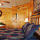 Bedroom with Jacuzzi in Cabin 857 (A Dream Come True) at Eagles Ridge Resort at Pigeon Forge, Tennessee.