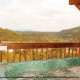 Deck with hot tub overlooking nature in cabin 859 (Absolute Paradise) , in Pigeon Forge, Tennessee.