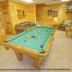 Game room with pool table in cabin 859 (Absolute Paradise) , in Pigeon Forge, Tennessee.