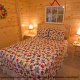 Country Bedroom View of Cabin 860 (Cozy Bear Overlook) at Eagles Ridge Resort at Pigeon Forge, Tennessee.
