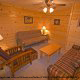 Den View of Cabin 860 (Cozy Bear Overlook) at Eagles Ridge Resort at Pigeon Forge, Tennessee.