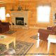 Living room with fireplace in cabin 861 (Mountain View Lodge) at Eagles Ridge Resort at Pigeon Forge, Tennessee.
