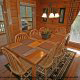 Large country dining room in cabin 864 (The Cedars) at Eagles Ridge Resort at Pigeon Forge, Tennessee.