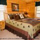 One of the many fully furnished luscious bedrooms in cabinOne of the many fully furnished luscious bedrooms in cabin 88 (Mountain Magic), in Pigeon Forge, Tennessee.