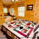 One of the many fully furnished luscious bedrooms in cabin 88 (Mountain Magic), in Pigeon Forge, Tennessee.