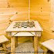 Use this wooden game table in cabin 88\'s game room (Mountain Magic), in Pigeon Forge, Tennessee. 