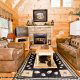 Snuggle up on the couch and enjoy the warmth of the fireplace in cabin 88 (Mountain Magic), in Pigeon Forge, Tennessee. 