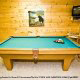 Play a game of pool on this large pool table in cabin 88 (Mountain Magic), in Pigeon Forge, Tennessee. 