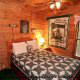 Large Bedroom View of Cabin 9 (Eagles Nest) at Eagles Ridge Resort at Pigeon Forge, Tennessee.