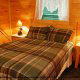 Country bedroom in cabin 91 (Eagles Beauty) , in Pigeon Forge, Tennessee.