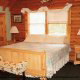Beautifully Furnished Bedroom View of Cabin 92 (Virginias Villa) at Eagles Ridge Resort at Pigeon Forge, Tennessee.