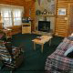 Living Room View with Fire Place in Cabin 92 (Virginias Villa) at Eagles Ridge Resort at Pigeon Forge, Tennessee.