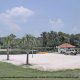 Volleyball court by the pond at The Star Island Resort in Orlando Florida.