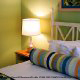 Colorful Bedroom View at Barefoot'n Resort in Orlando, Florida. Comfortable relaxation awaits you after exciting entertainment while on Christmas Vacation.
