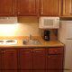 Nicely Furnished Kitchenette View at Best Western Castillo Del Sol in Daytona Beach, Florida.