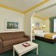 Comfort Suites Maingate East Resort queen room