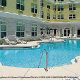 Outdoor Pool View at Country Inn & Suites in Cocoa Beach, Florida.