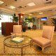 Relax and read a book in the spacious Waiting Area in the Lobby at Crowne Plaza Hotel Orlando - Universal in Orlando, Florida.
