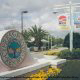 Beautifully Landscaped Entrance and Logo Sign at the Cypress Pointe Grande Villas Resort in Orlando, Florida.