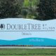 Logo Sign View at DoubleTree by Hilton Hotel Orlando at SeaWorld in Orlando, Florida. Enjoy quality accommodations in this charming location during your New Years Family Getaway.