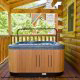 Hot tub on one of the cabin porches at Eagles Ridge Resort