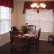 Warmly decorated dining room at The Suites At Fall Creek in Branson Missouri.