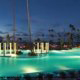 The Gran Meliá opens to Puerto Rico\'s largest lagoon-style pool, featuring four integrated whirlpools, submersed in a scene of lush foliage at Gran Melia Gulf Resort, Rio Grande, Puerto Rico.
