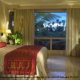 King size bed in junior suite at Gran Melia Gulf Resort, Rio Grande, Puerto Rico.