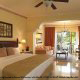 King size bed in ocean front junior suite at Gran Melia Gulf Resort, Rio Grande, Puerto Rico.